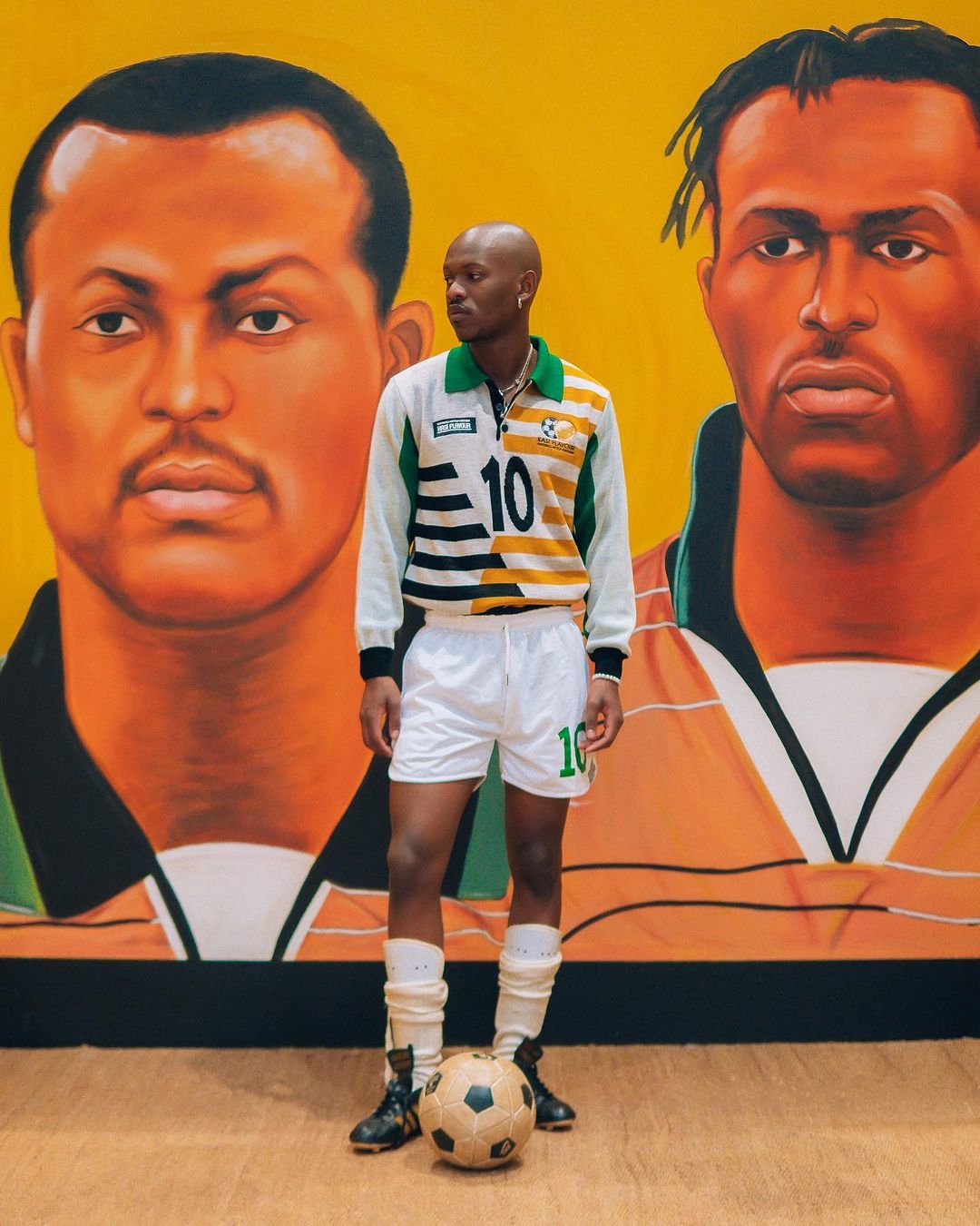 Mural Depicting Brazilian Soccer Legend Pele Embracing Late